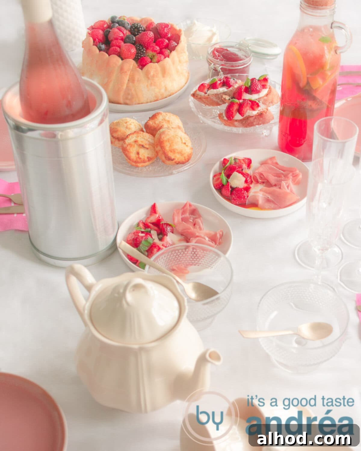 Strawberry High Tea Six Recipes Perfectly Planned 4 a table with recipes for a summer high tea with strawberries, including a tea pot, wine and lots of strawberreis