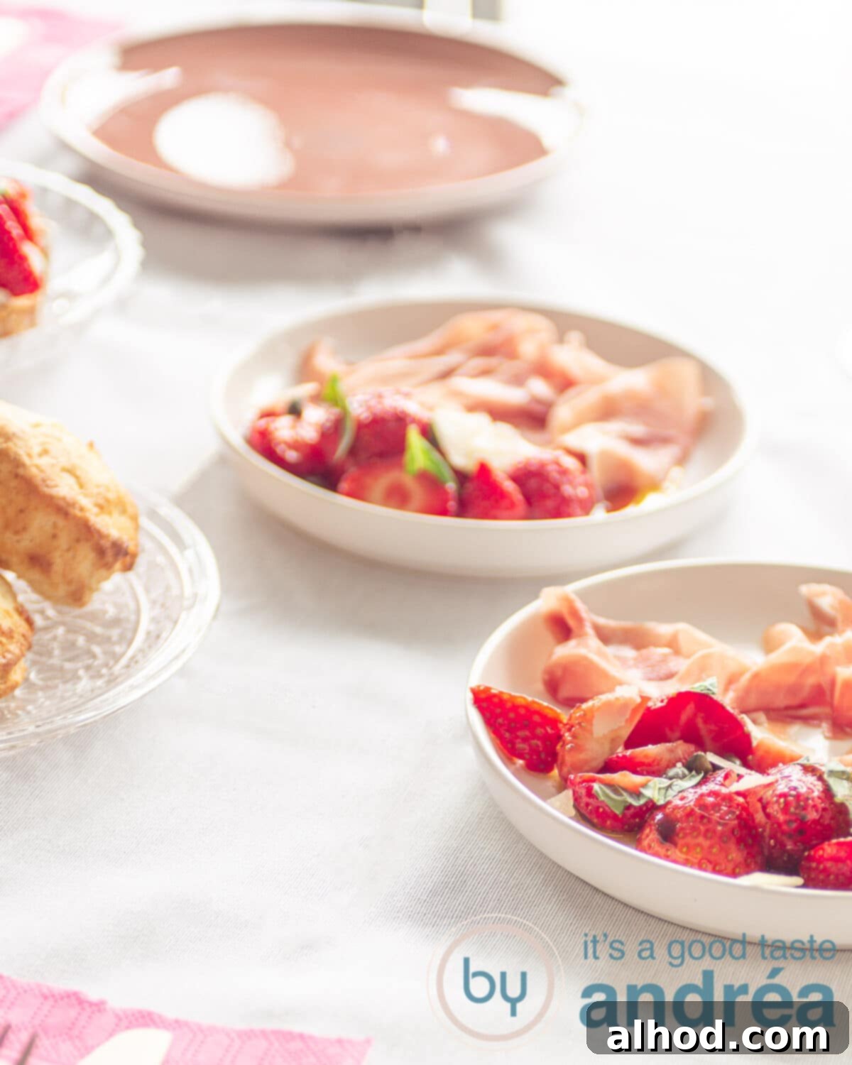 Strawberry High Tea Six Recipes Perfectly Planned 5 strawberries marinated in balsamic vinegar on a plate and some scones