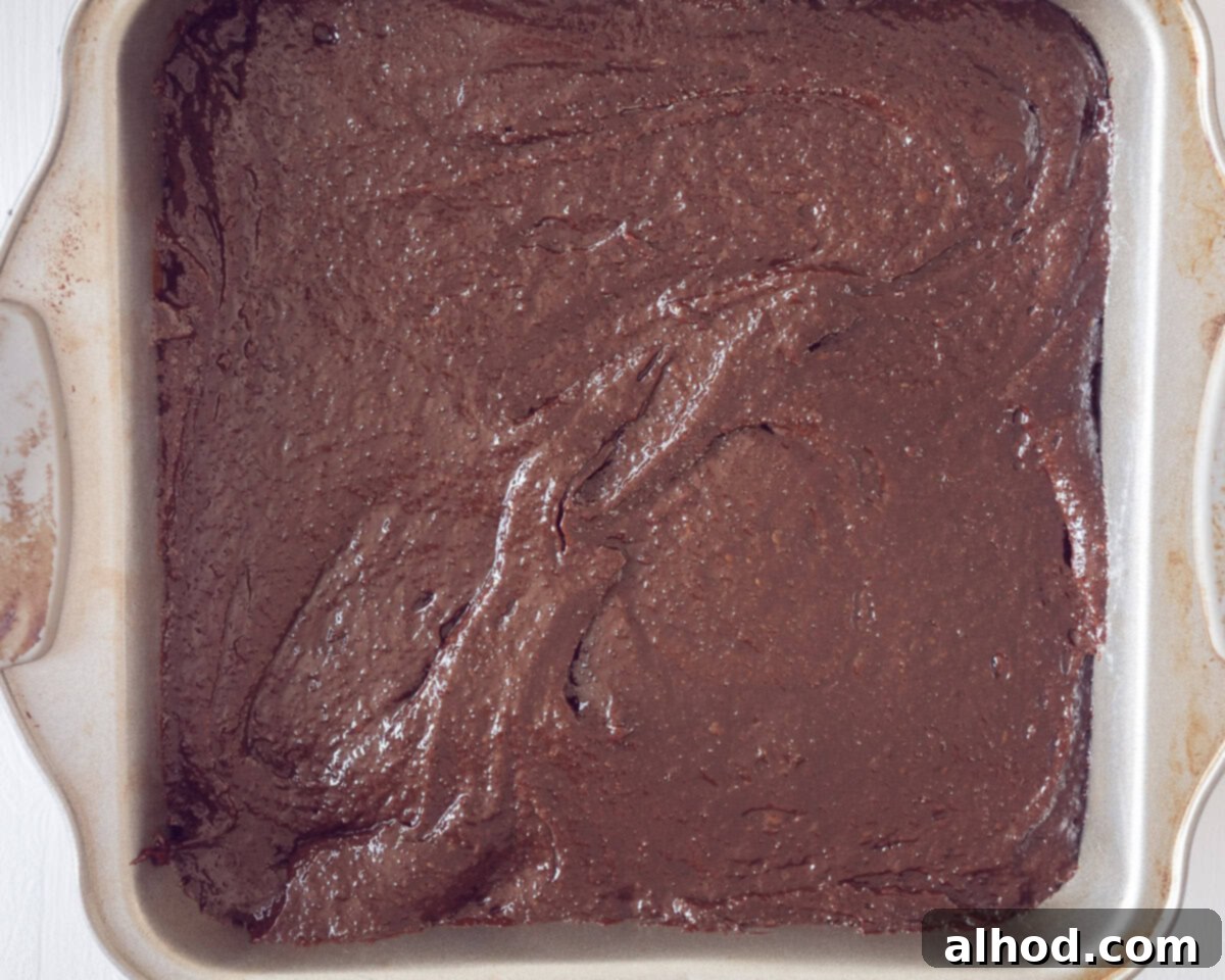 Decadent Chocolate Cheesecake Brownies 6 A brownie layer poured into the brownie plate