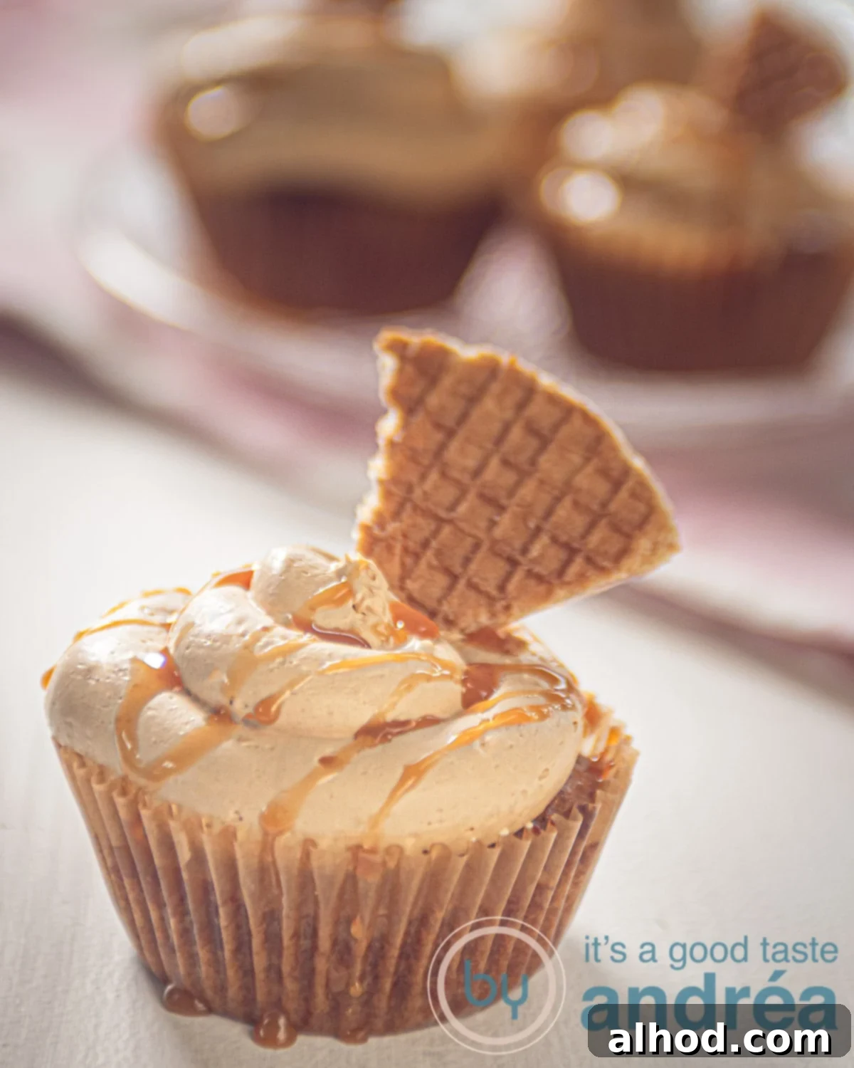 Easy Dutch Stroopwafel Cupcakes 9 a stroopwafel cupcake in front and in the background some more