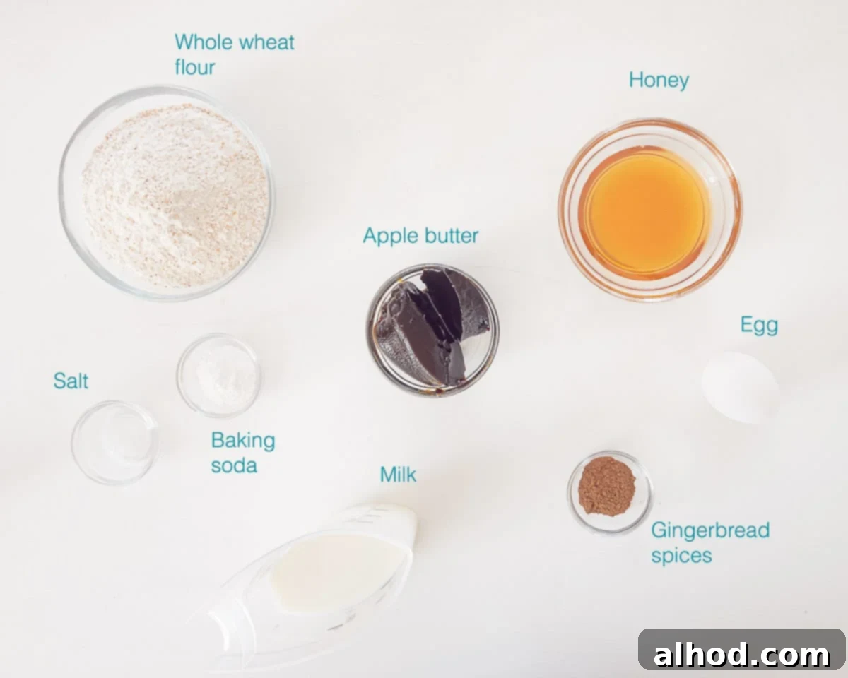 Guilt-Free Sweet Morning Cake 3 Ingredients for Healthy Sweet Breakfast Cake individually labeled on a white background, including whole wheat flour, baking powder, salt, milk, apple butter, honey, egg, and speculaas mix spices.