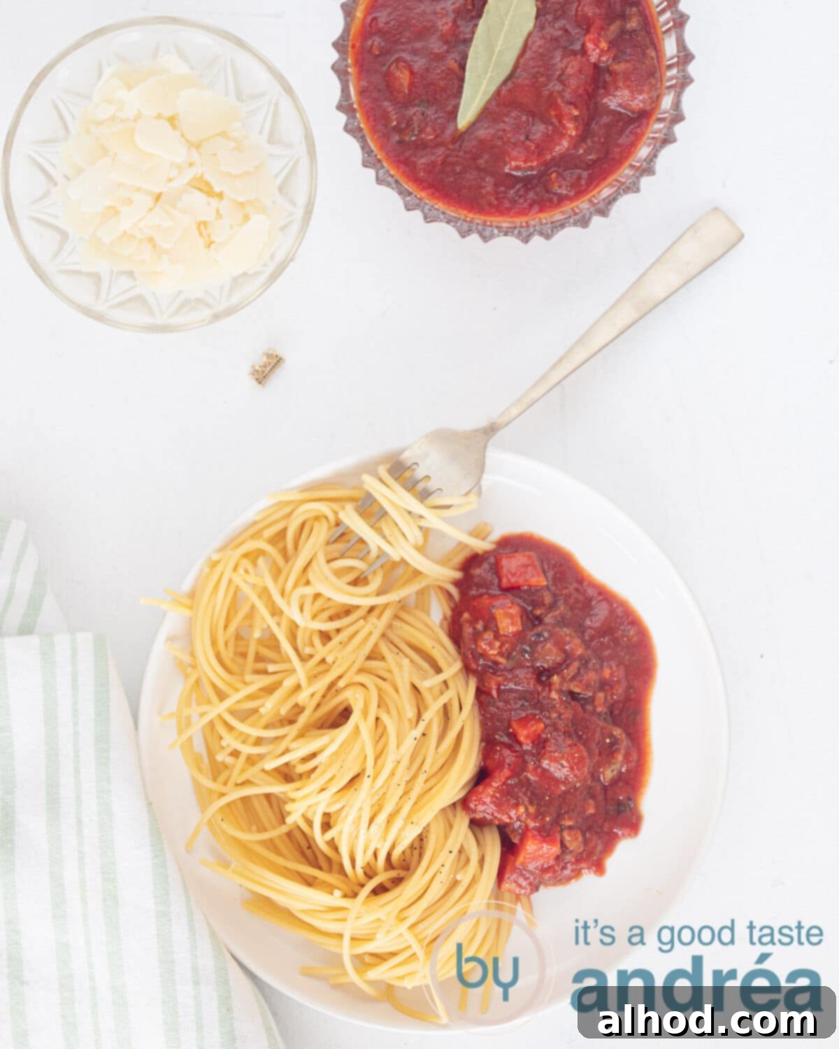 Rich Slow Cooker Beef Spaghetti Sauce 2 photo above: plate with spaghetti and crockpot spaghetti sauce with meat