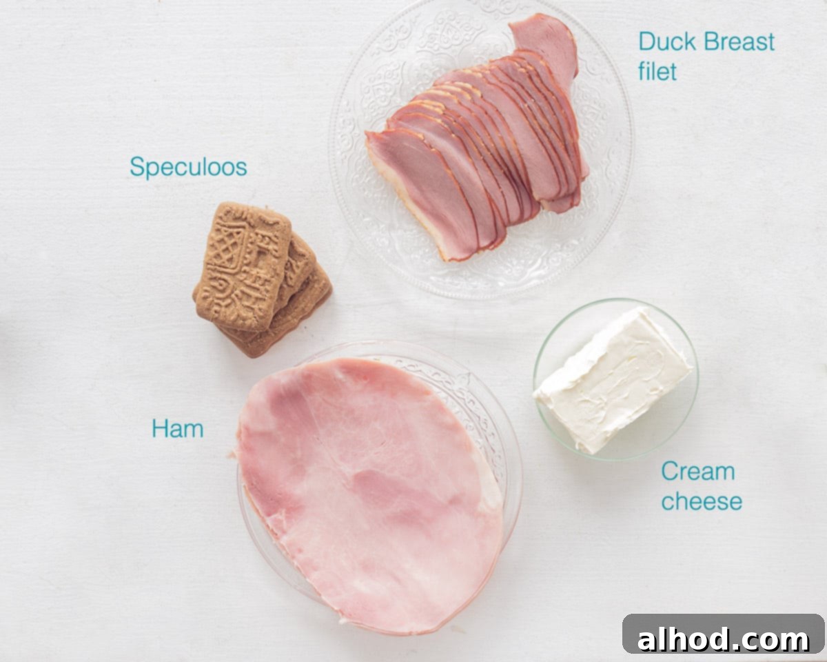 Amuse-Bouche Trio: Ham, Shrimp, Goat Cheese 3 Ingredients Amuse-bouche with Ham and Duck breast filet individually labeled with a white background