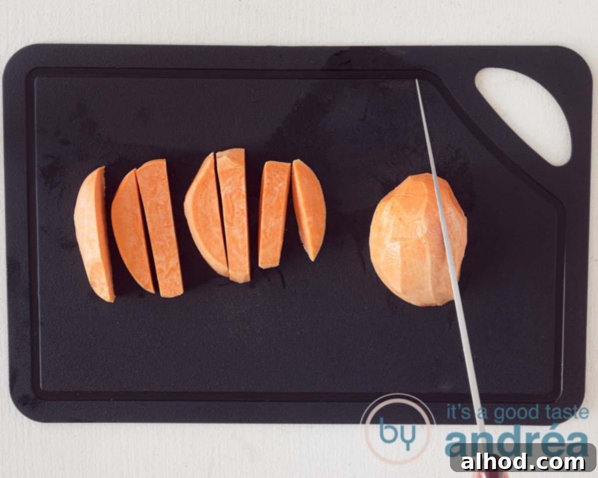Crispy Air Fryer Sweet Potatoes with Creamy Dipping Sauce 4 The sweet potato is cut into fries
