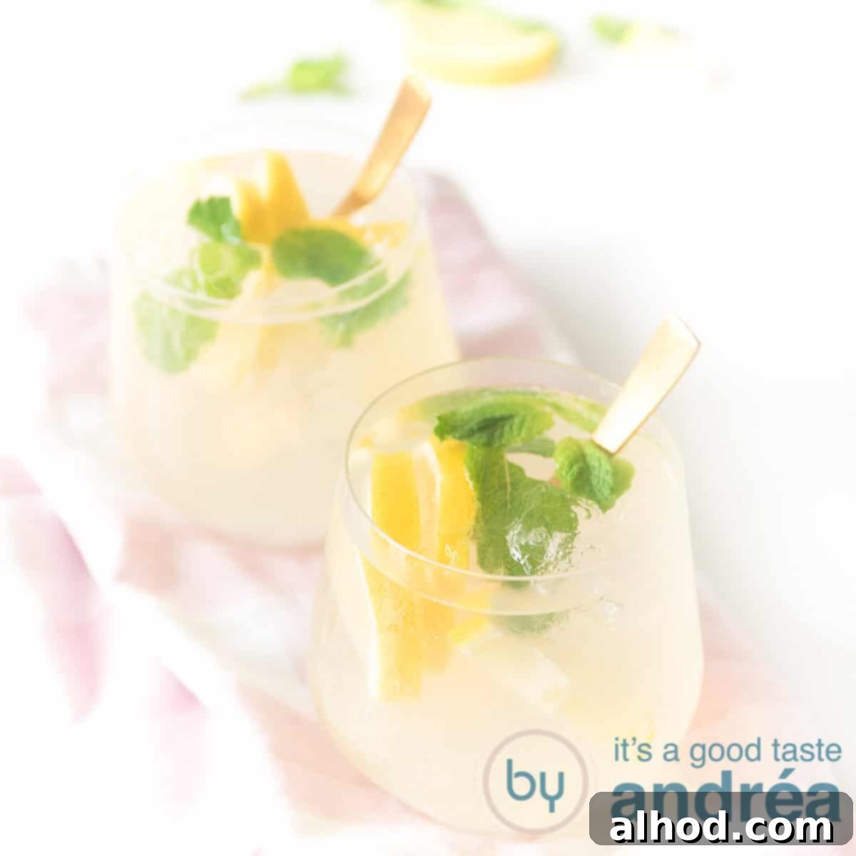 Zesty Limoncello Gin Cocktail 9 square photo with two glasses filled with a cocktail Gin and limoncello