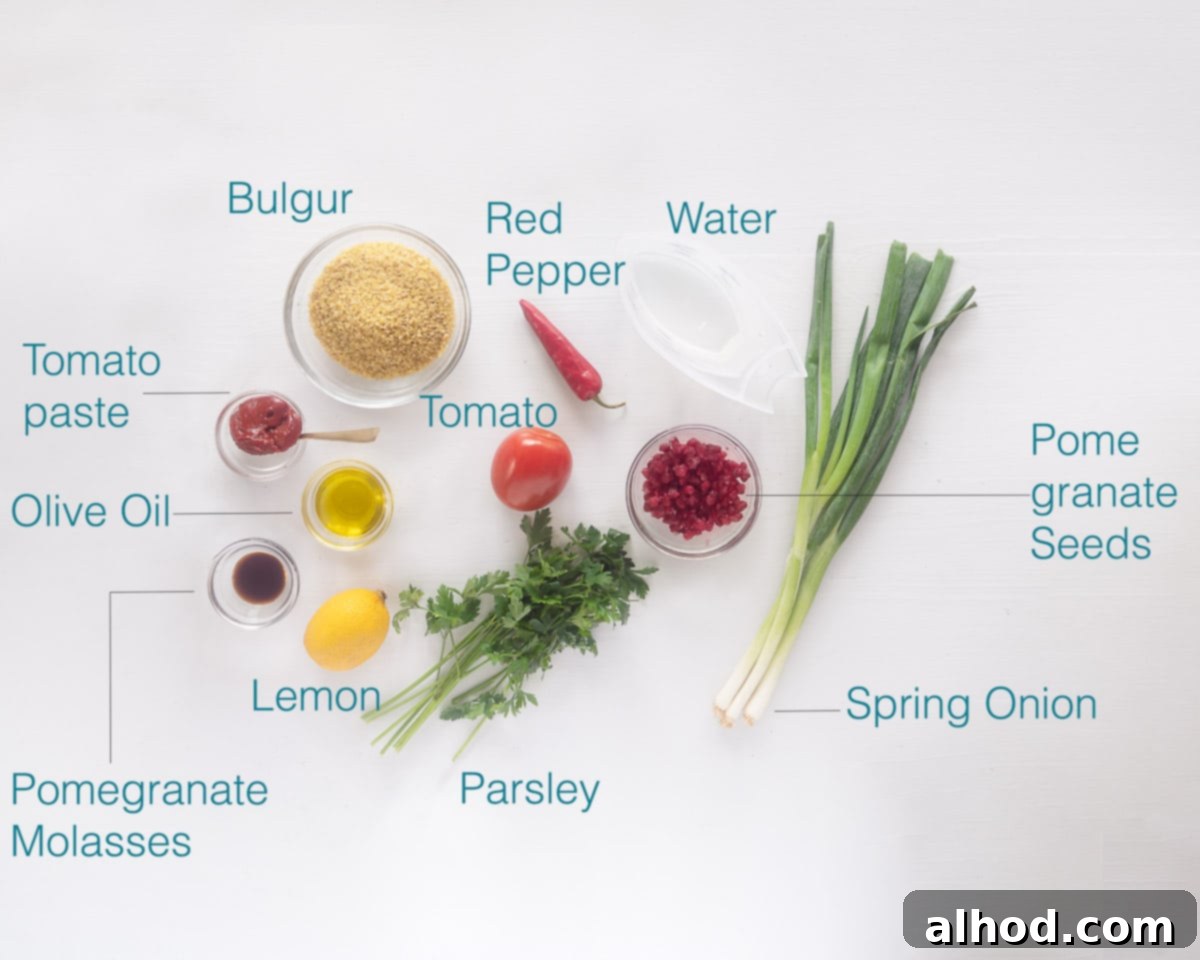 The Essential Turkish Kisir A Flavorful Bulgur Salad 3 A selection of fresh ingredients laid out for Kisir: bulgur, pomegranate molasses, tomato, parsley, spring onions, and red chili.