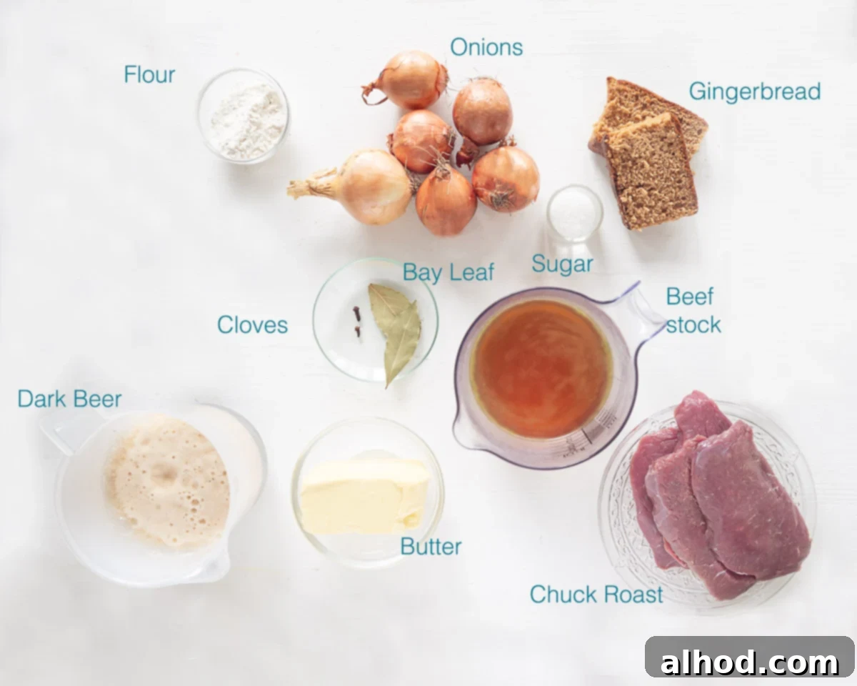 Classic Dutch Hachee Beef and Onion Stew 3 A flat lay photograph showcasing all the ingredients required for Slow Cooker Hachee Recipe (Dutch Beef and Onion Stew), neatly arranged and individually labeled on a pristine white background. Items include chuck roast, sliced onions, a bottle of dark beer, gingerbread slices, beef stock, butter, flour, salt, pepper, bay leaves, cloves, and sugar.