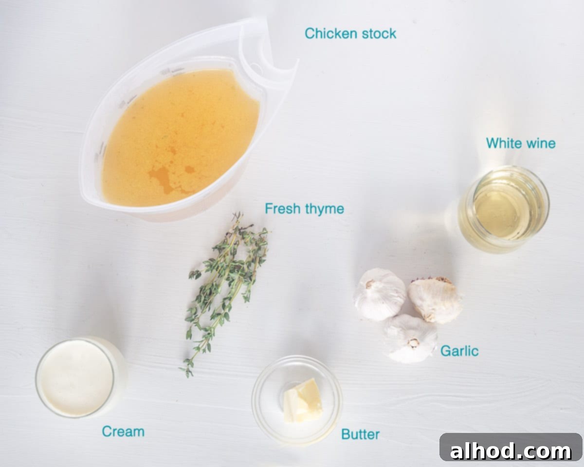Velvety Roasted Garlic Soup 3 A flat lay photograph of all the ingredients for creamy roasted garlic soup, neatly arranged on a white background with individual labels.