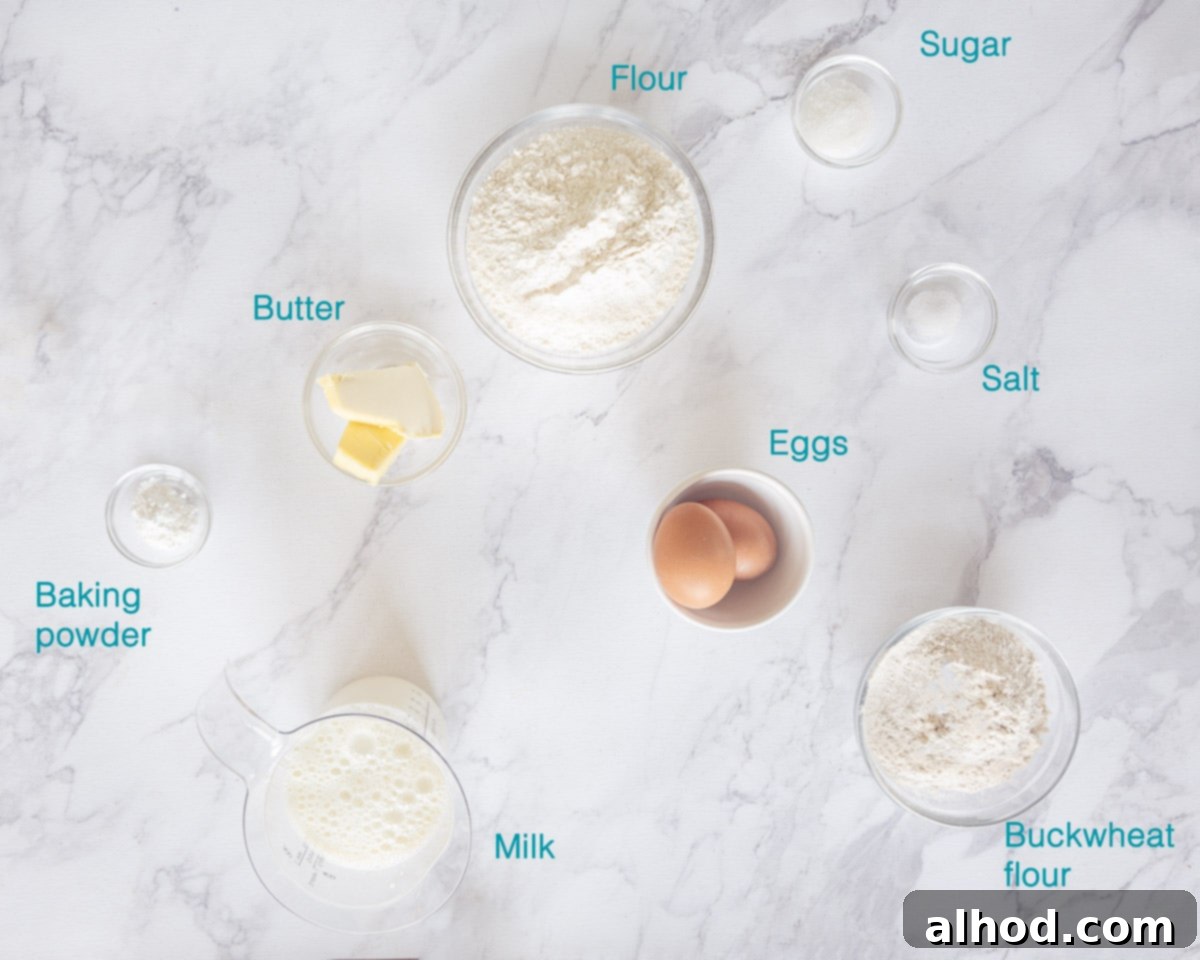 Dutch Poffertjes: Fluffy Mini Delights 3 Ingredients Poffertjes (Dutch Mini Pancakes), individually labelled on a marble white background