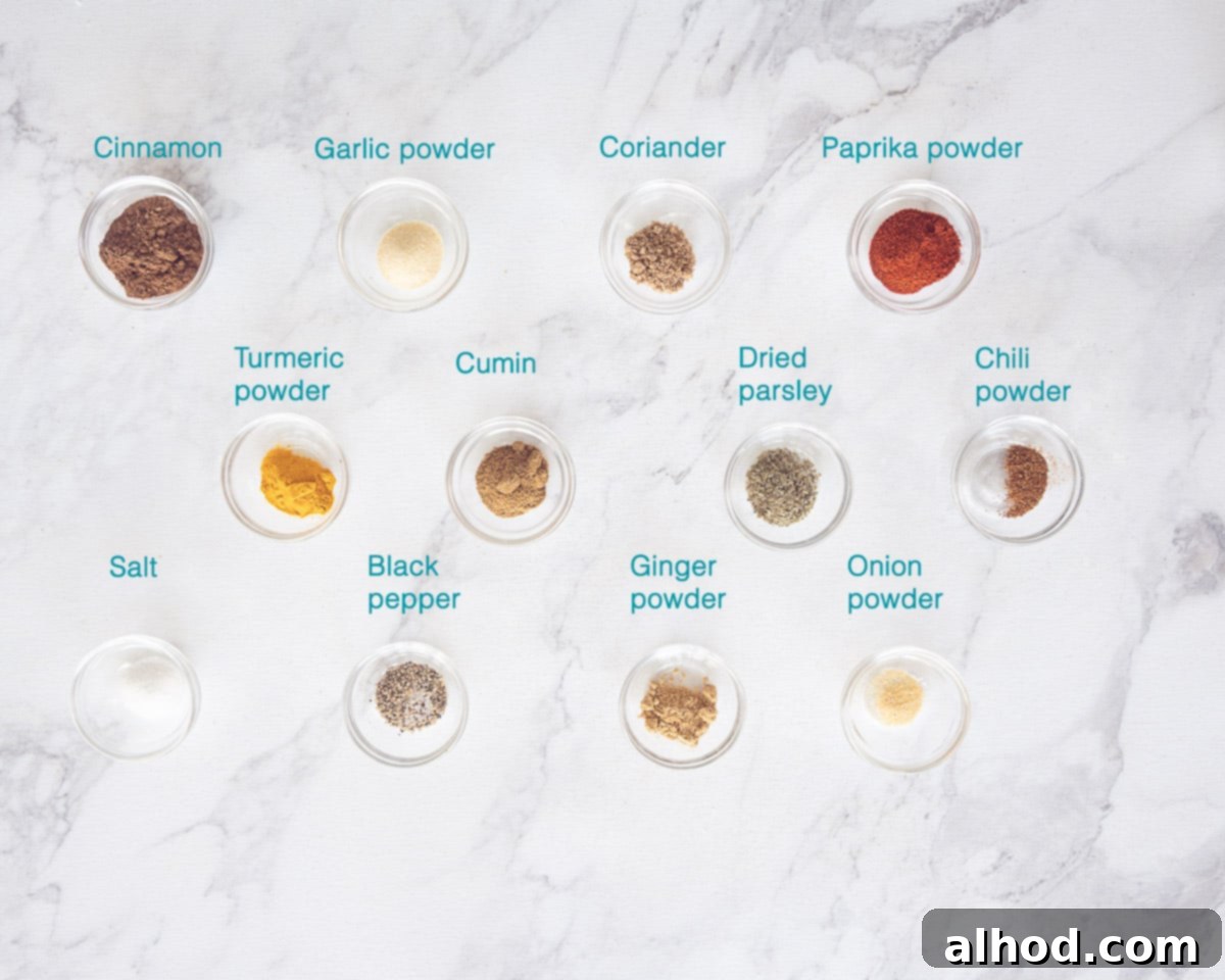 Homemade Shawarma Spice Mix 3 Ingredients for a Shawarma Spice Mix Recipe, individually labelled on a marble background, showcasing fresh, vibrant spices.