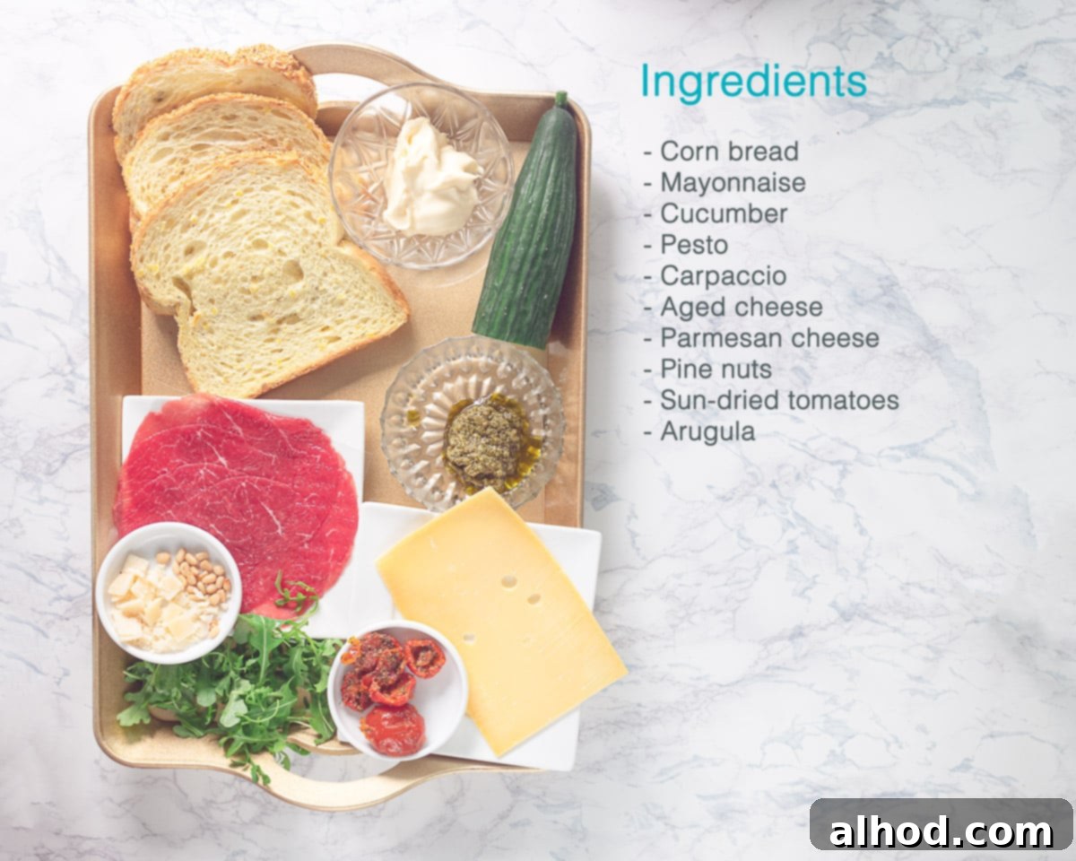 Gourmet Carpaccio Sandwich 3 Ingredients Sandwich with Beef Carpaccio on a golden tray on the left. On the right a white marble background and a text description of the ingredients.