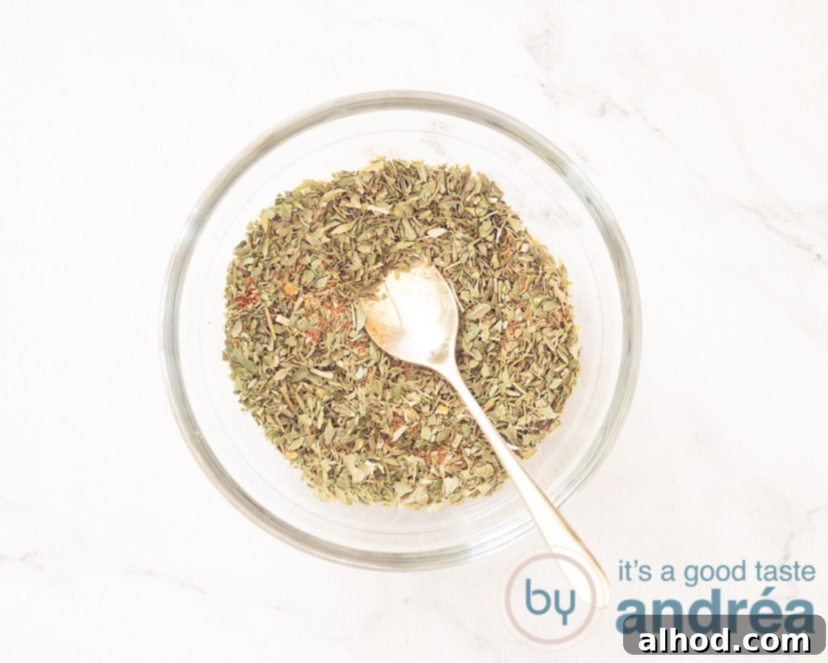 Authentic Homemade Gyros Seasoning 5 The gyros spices are mixed together with a spoon.