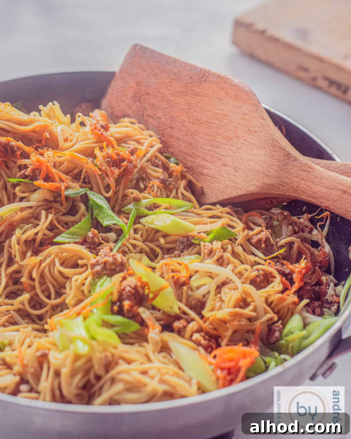 Savory Beef Chow Mein Fresh Vegetables and Signature Sauce 3 A wok filled with noodles, fresh vegetables, minced meat and a delicious sauce