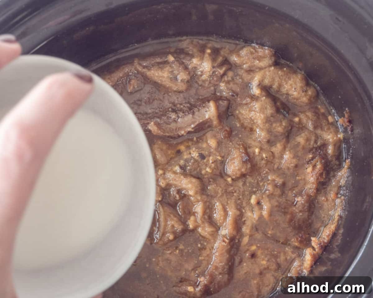Melt-in-Your-Mouth Slow Cooker Dutch Sukadelapjes 7 A corn starch slurry is added to the sauce.