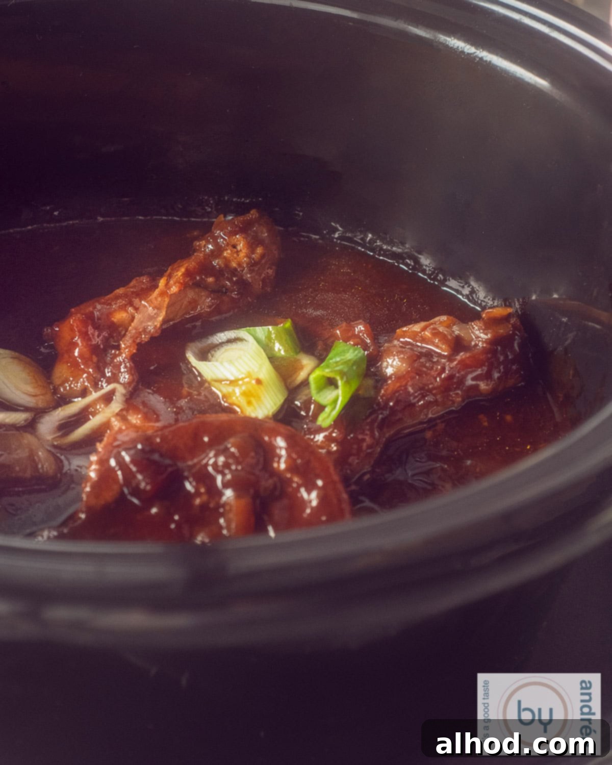 Caramelized Soy Pork Chops 3 A slow cooker filled with pork chops in a velvety soy sauce.