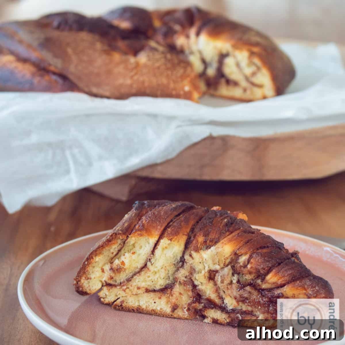 Chocolate Hazelnut Swirl Bread 4 A square picture of a Nutella twist bread on a pink plate.