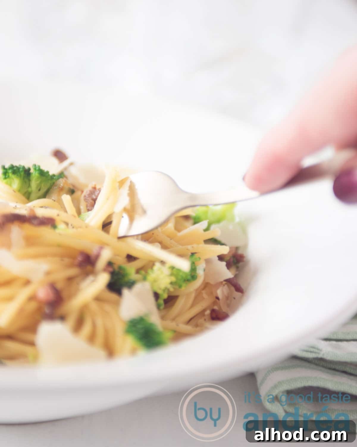 Effortless Broccoli & Bacon Pasta 8 Delicious bowl of broccoli bacon pasta with ground beef, ready to serve