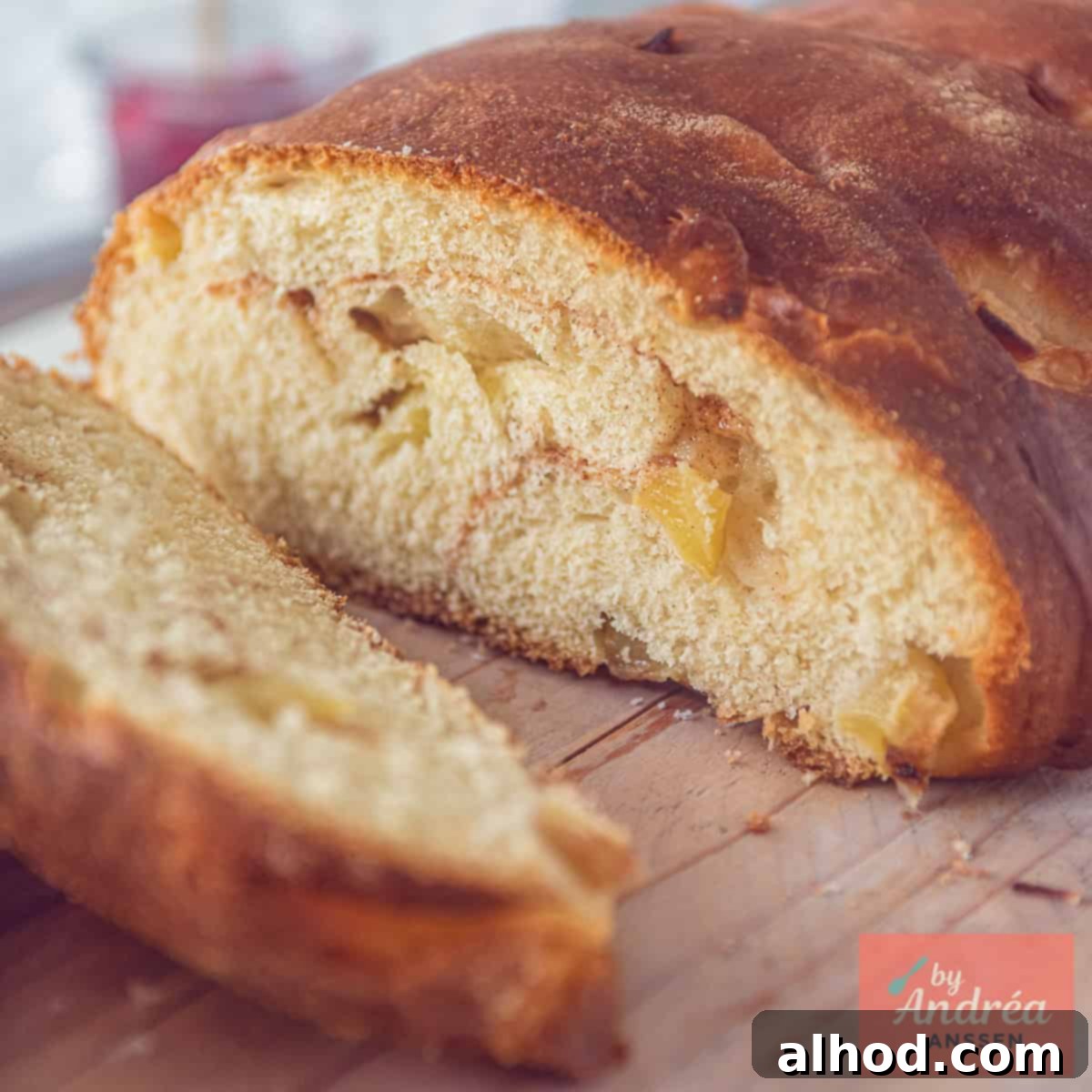 Warm Apple Cinnamon Loaf 4 A square photo of a sliced apple cinnamon bread loaf, showing its soft interior and the perfect swirl.