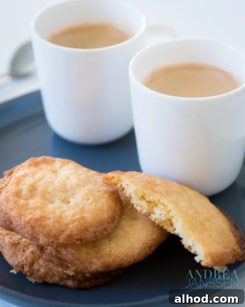 Bake Delicious Cookies Easily 3 Freshly baked easy cookies served with a hot cup of coffee, a perfect simple treat.