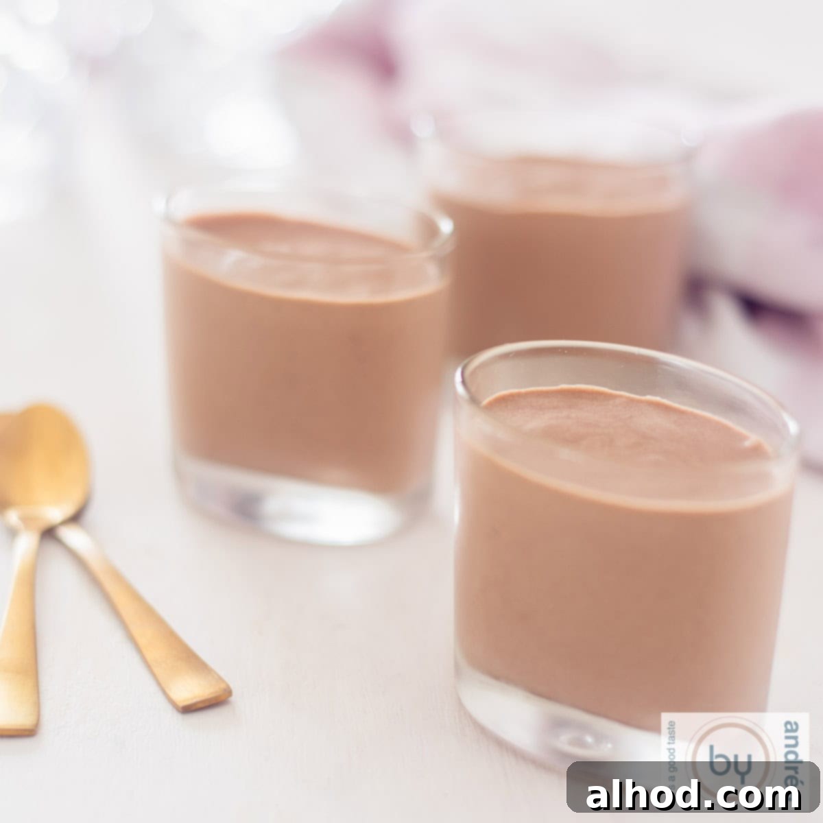 Christmas Dessert Extravaganza 2 three amuse glasses filled with chocolate mousse with a tic