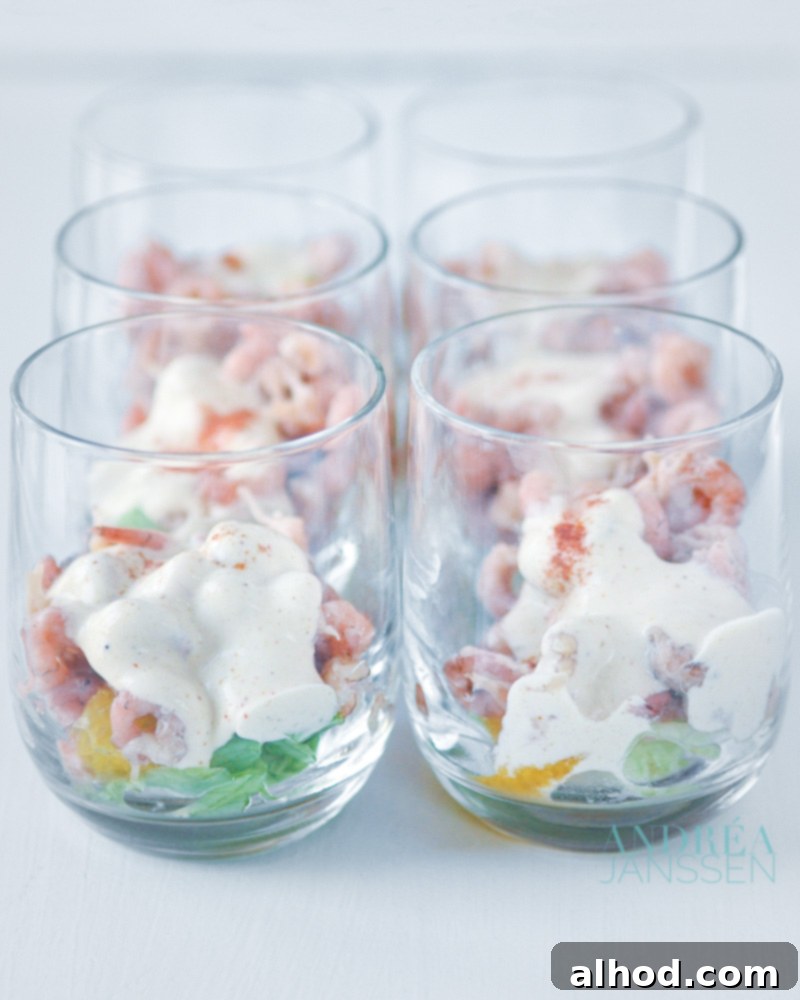 Classic shrimp cocktail with a zesty orange twist, perfect festive starter