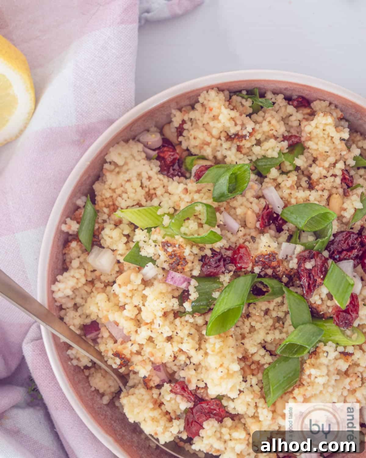 Zesty Cranberry Couscous Salad 3 Photo from above with couscous, cranberries, parsley, lemon