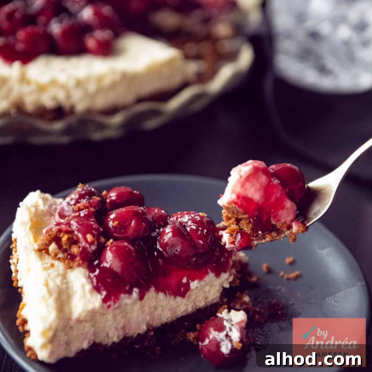 A square photo of a piece of monchou cake with a bite taken off it.