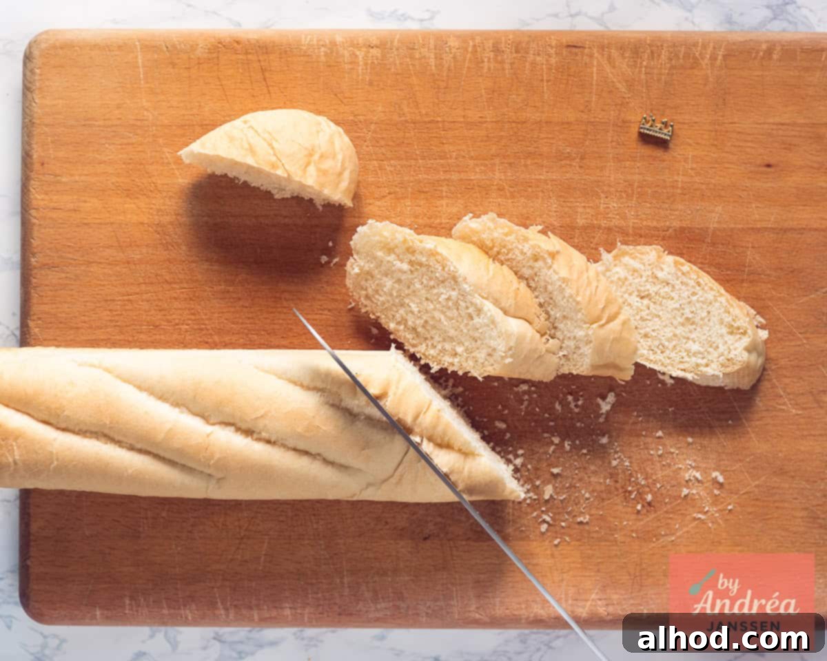 A baguette is cut into slices.