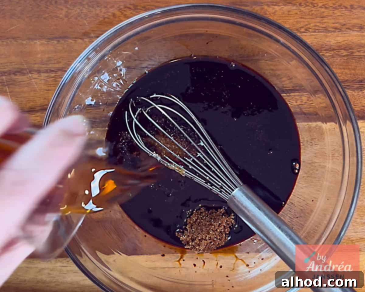 Quick Chicken Pad See Ew: 20-Minute Thai Noodle Perfection 4 Mixing the sauce ingredients for Chicken Pad See Ew in a bowl