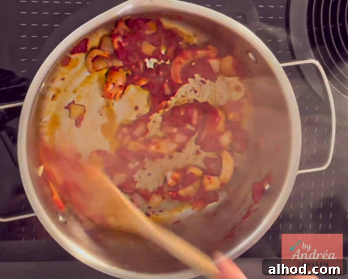 30-Minute Fiesta Rice 5 Fry tomato puree, garlic and onion in the pan